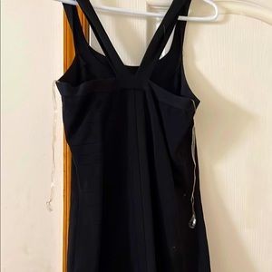 Express dress size L. Has small black raised stripes. Hard to see in picture.